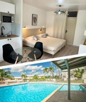 Superbe studio avec Piscine, au coeur de la Marina! Village Soleil ! Proche Aéroport & Ferry